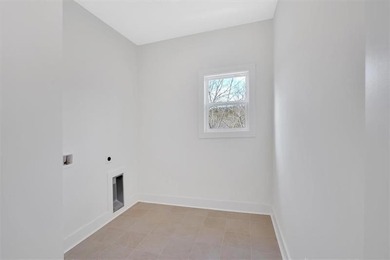 This beautiful two-story home on a full unfinished basement is on The Plantation Golf Club in Georgia - for sale on GolfHomes.com, golf home, golf lot