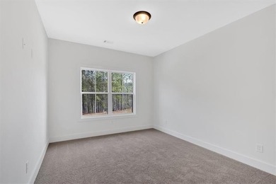 This beautiful two-story home on a full unfinished basement is on The Plantation Golf Club in Georgia - for sale on GolfHomes.com, golf home, golf lot