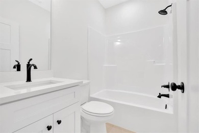 This beautiful two-story home on a full unfinished basement is on The Plantation Golf Club in Georgia - for sale on GolfHomes.com, golf home, golf lot