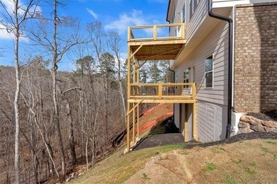 This beautiful two-story home on a full unfinished basement is on The Plantation Golf Club in Georgia - for sale on GolfHomes.com, golf home, golf lot