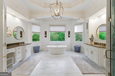 COMMANDING MASSIVE PALATIAL COLUMNS, THIS SUGARLOAF COUNTRY CLUB on TPC At Sugarloaf Golf Club in Georgia - for sale on GolfHomes.com, golf home, golf lot