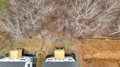 This beautiful two-story home on a full unfinished basement is on The Plantation Golf Club in Georgia - for sale on GolfHomes.com, golf home, golf lot