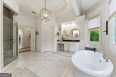 COMMANDING MASSIVE PALATIAL COLUMNS, THIS SUGARLOAF COUNTRY CLUB on TPC At Sugarloaf Golf Club in Georgia - for sale on GolfHomes.com, golf home, golf lot