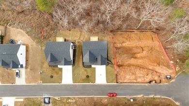This beautiful two-story home on a full unfinished basement is on The Plantation Golf Club in Georgia - for sale on GolfHomes.com, golf home, golf lot
