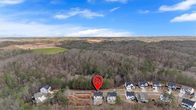 This beautiful two-story home on a full unfinished basement is on The Plantation Golf Club in Georgia - for sale on GolfHomes.com, golf home, golf lot