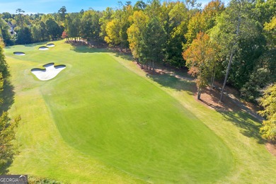 COMMANDING MASSIVE PALATIAL COLUMNS, THIS SUGARLOAF COUNTRY CLUB on TPC At Sugarloaf Golf Club in Georgia - for sale on GolfHomes.com, golf home, golf lot