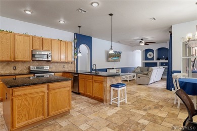 Experience refined Florida living in Homosassa with this on Sugarmill Woods Golf and Country Club in Florida - for sale on GolfHomes.com, golf home, golf lot