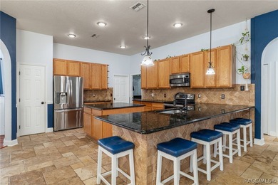 Experience refined Florida living in Homosassa with this on Sugarmill Woods Golf and Country Club in Florida - for sale on GolfHomes.com, golf home, golf lot