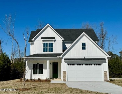 Welcome to The Reserve at Ashewood's only fully-built and on Olde Point Golf and Country Club in North Carolina - for sale on GolfHomes.com, golf home, golf lot