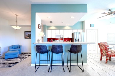 Panoramic West facing lake and fairway views abound in this on Naples Heritage Golf and Country Club in Florida - for sale on GolfHomes.com, golf home, golf lot