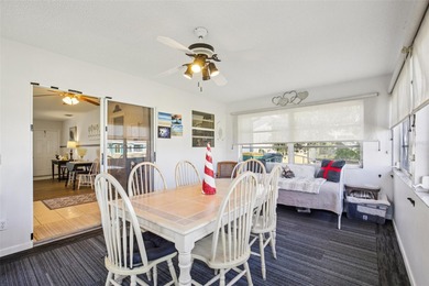 Under contract-accepting backup offers. AFFORDABLE & ADORABLE! on Duffys Golf Center in Florida - for sale on GolfHomes.com, golf home, golf lot