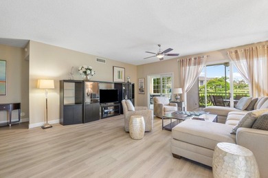 Gorgeous ground-level condo boasting picturesque panoramic lake on Broken Sound Golf and Club  in Florida - for sale on GolfHomes.com, golf home, golf lot