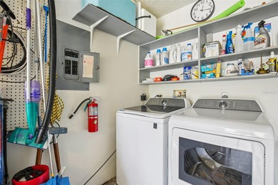 Under contract-accepting backup offers. AFFORDABLE & ADORABLE! on Duffys Golf Center in Florida - for sale on GolfHomes.com, golf home, golf lot