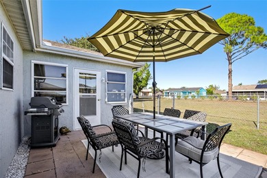 Under contract-accepting backup offers. AFFORDABLE & ADORABLE! on Duffys Golf Center in Florida - for sale on GolfHomes.com, golf home, golf lot