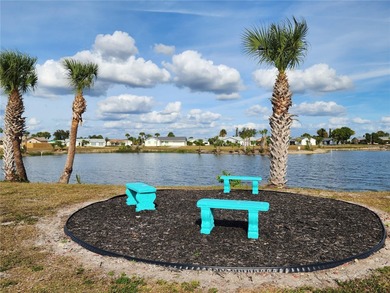 Under contract-accepting backup offers. AFFORDABLE & ADORABLE! on Duffys Golf Center in Florida - for sale on GolfHomes.com, golf home, golf lot