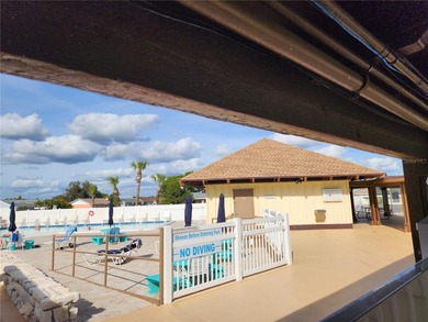 Under contract-accepting backup offers. AFFORDABLE & ADORABLE! on Duffys Golf Center in Florida - for sale on GolfHomes.com, golf home, golf lot