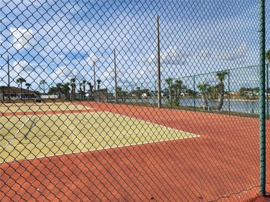 Under contract-accepting backup offers. AFFORDABLE & ADORABLE! on Duffys Golf Center in Florida - for sale on GolfHomes.com, golf home, golf lot