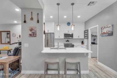 Welcome home to this beautifully upgraded residence located in on The Golf Club At Johnson Ranch in Arizona - for sale on GolfHomes.com, golf home, golf lot