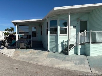 Welcome to Paradise! Rarely available, this nearly 1,400 sq. ft on Island Dunes Country Club in Florida - for sale on GolfHomes.com, golf home, golf lot