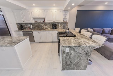 Location location!Beautiful remodeled  2 story penthouse with on Royal Palm Yacht and Country Club in Florida - for sale on GolfHomes.com, golf home, golf lot