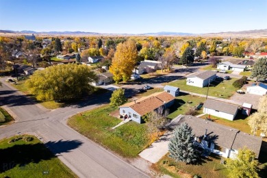 Welcome to 504 E. Fir St., where modern comfort meets small-town on Headwaters Golf Course in Montana - for sale on GolfHomes.com, golf home, golf lot