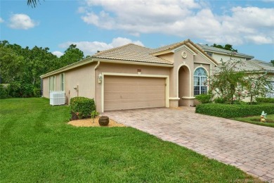 Beautiful Home in Jensen Beach Country Club situated on a on Eagle Marsh Golf Club in Florida - for sale on GolfHomes.com, golf home, golf lot
