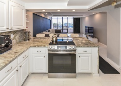 Location location!Beautiful remodeled  2 story penthouse with on Royal Palm Yacht and Country Club in Florida - for sale on GolfHomes.com, golf home, golf lot