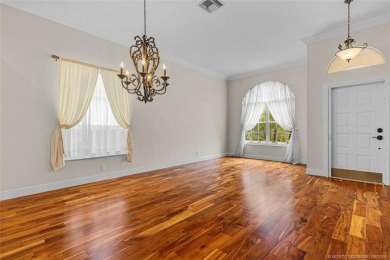 Beautiful Home in Jensen Beach Country Club situated on a on Eagle Marsh Golf Club in Florida - for sale on GolfHomes.com, golf home, golf lot