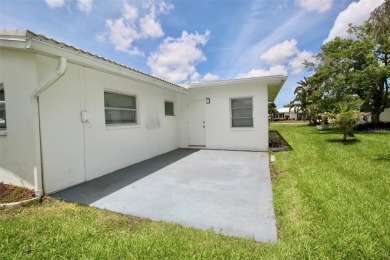 **MAINLANDS OF TAMARAC BY THE GULF SHOWPLACE** Beautifully on Mainlands Golf Club in Florida - for sale on GolfHomes.com, golf home, golf lot