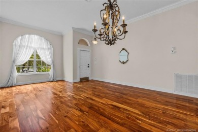 Beautiful Home in Jensen Beach Country Club situated on a on Eagle Marsh Golf Club in Florida - for sale on GolfHomes.com, golf home, golf lot