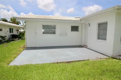 **MAINLANDS OF TAMARAC BY THE GULF SHOWPLACE** Beautifully on Mainlands Golf Club in Florida - for sale on GolfHomes.com, golf home, golf lot
