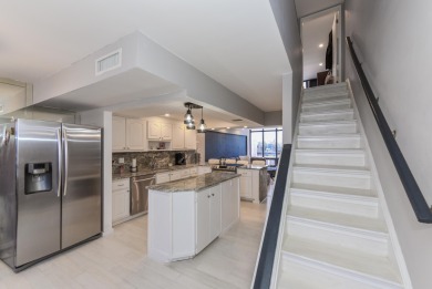 Location location!Beautiful remodeled  2 story penthouse with on Royal Palm Yacht and Country Club in Florida - for sale on GolfHomes.com, golf home, golf lot