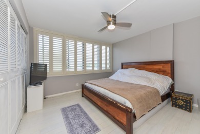 Location location!Beautiful remodeled  2 story penthouse with on Royal Palm Yacht and Country Club in Florida - for sale on GolfHomes.com, golf home, golf lot