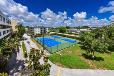Location location!Beautiful remodeled  2 story penthouse with on Royal Palm Yacht and Country Club in Florida - for sale on GolfHomes.com, golf home, golf lot