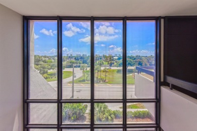 Location location!Beautiful remodeled  2 story penthouse with on Royal Palm Yacht and Country Club in Florida - for sale on GolfHomes.com, golf home, golf lot