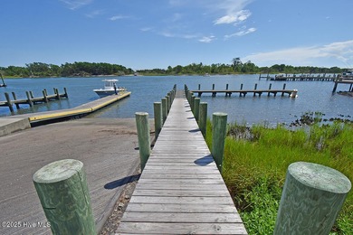 Don't miss this beautiful coastal home in the heart of Beaufort! on North River Club in North Carolina - for sale on GolfHomes.com, golf home, golf lot