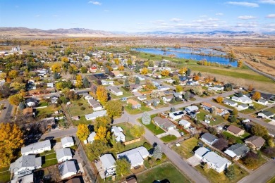 Welcome to 504 E. Fir St., where modern comfort meets small-town on Headwaters Golf Course in Montana - for sale on GolfHomes.com, golf home, golf lot