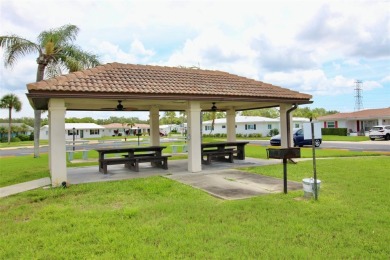 **MAINLANDS OF TAMARAC BY THE GULF SHOWPLACE** Beautifully on Mainlands Golf Club in Florida - for sale on GolfHomes.com, golf home, golf lot