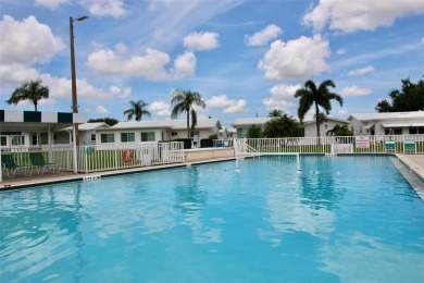 **MAINLANDS OF TAMARAC BY THE GULF SHOWPLACE** Beautifully on Mainlands Golf Club in Florida - for sale on GolfHomes.com, golf home, golf lot