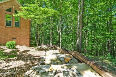 Experience comfort and serenity in the heart of Tennessee's golf on Heatherhurst Golf Course in Tennessee - for sale on GolfHomes.com, golf home, golf lot