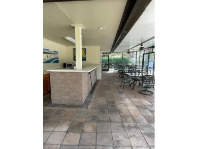 Spacious first floor condo is a must see!! Bright, Open and Airy on Royal Palm Golf Club in Florida - for sale on GolfHomes.com, golf home, golf lot