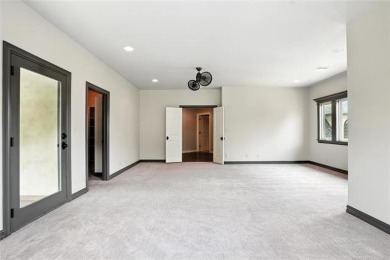 Stunning home in the luxury gated community of The Bluffs at on The Patriot in Oklahoma - for sale on GolfHomes.com, golf home, golf lot