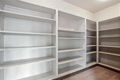 Stunning home in the luxury gated community of The Bluffs at on The Patriot in Oklahoma - for sale on GolfHomes.com, golf home, golf lot