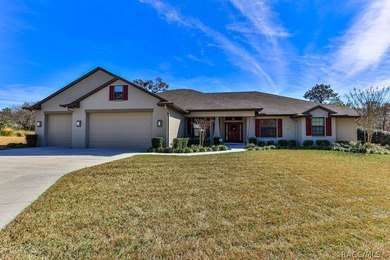This stunning Move-In Ready 4-bedroom 2-bath POOL home was built on Sugarmill Woods Golf and Country Club in Florida - for sale on GolfHomes.com, golf home, golf lot