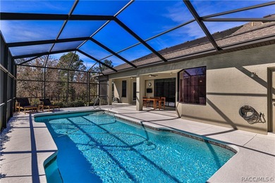This stunning Move-In Ready 4-bedroom 2-bath POOL home was built on Sugarmill Woods Golf and Country Club in Florida - for sale on GolfHomes.com, golf home, golf lot