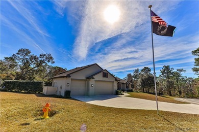 This stunning Move-In Ready 4-bedroom 2-bath POOL home was built on Sugarmill Woods Golf and Country Club in Florida - for sale on GolfHomes.com, golf home, golf lot