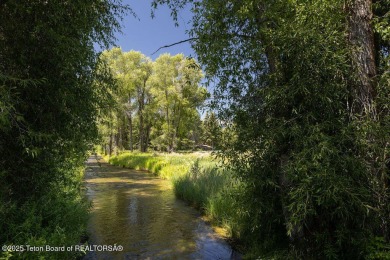 The Rockefeller family, celebrated for their stewardship and on Jackson Hole Golf and Tennis Club in Wyoming - for sale on GolfHomes.com, golf home, golf lot