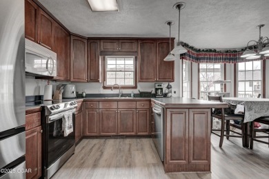Beautiful 4 bedroom, 3 bath brick home in the heart of Monett on Windmill Ridge Golf Course in Missouri - for sale on GolfHomes.com, golf home, golf lot