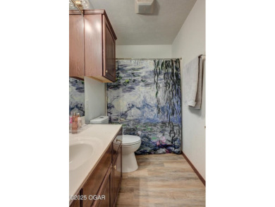 Beautiful 4 bedroom, 3 bath brick home in the heart of Monett on Windmill Ridge Golf Course in Missouri - for sale on GolfHomes.com, golf home, golf lot