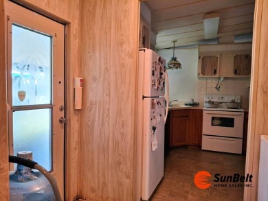 Handyman Special! 2BR/2BA | Spacious Fixer-Upper in Rolling on Rolling Greens Executive Golf Community in Florida - for sale on GolfHomes.com, golf home, golf lot